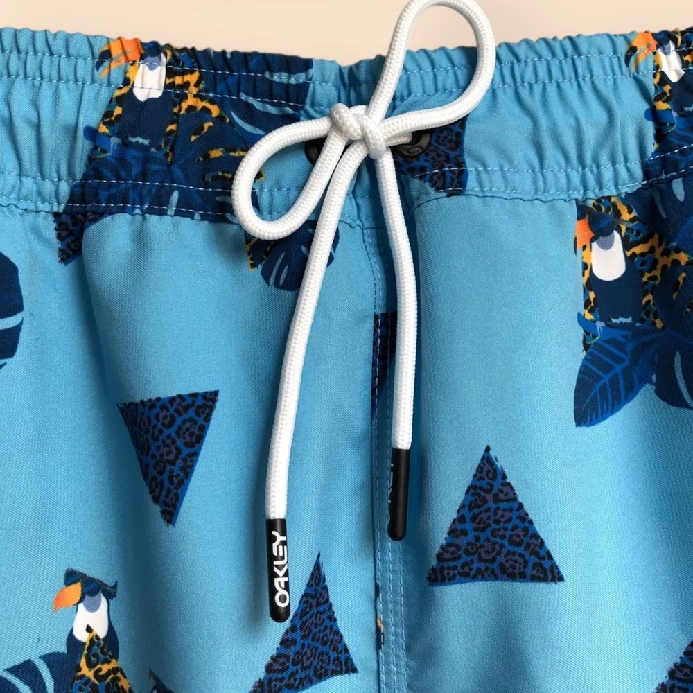Oakley NWT MENS Toucan Tropics 16” Beach Shorts Blue Active Swim MENS Large